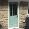 Chartwell green cottage style door with white outer frame, Rossendale.
